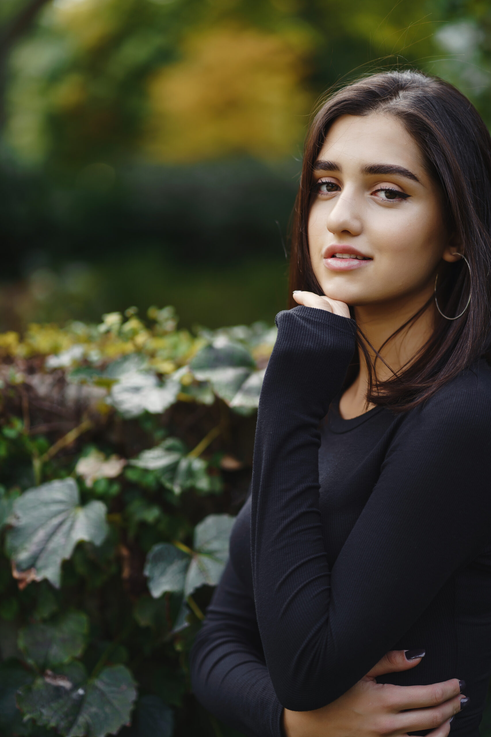 brunette girl walking through the park in Chicago during fall